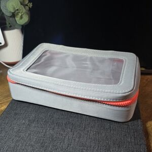 FLYTE.70 Gray Cosmetic Bag with Red Zipper